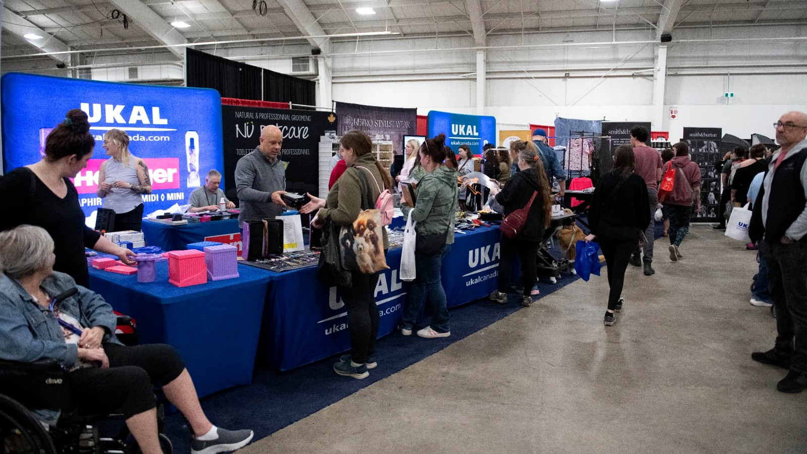 Visitors exploring vendor booths at the Canadian Pet Expo